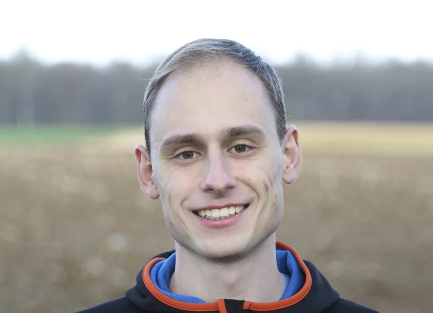 DAV Heilbronn Team | © DAV Heilbronn lächelnder junger Mann mit kurzen, blonden Haaren in einer schwarzen Jacke | © DAV Heilbronn